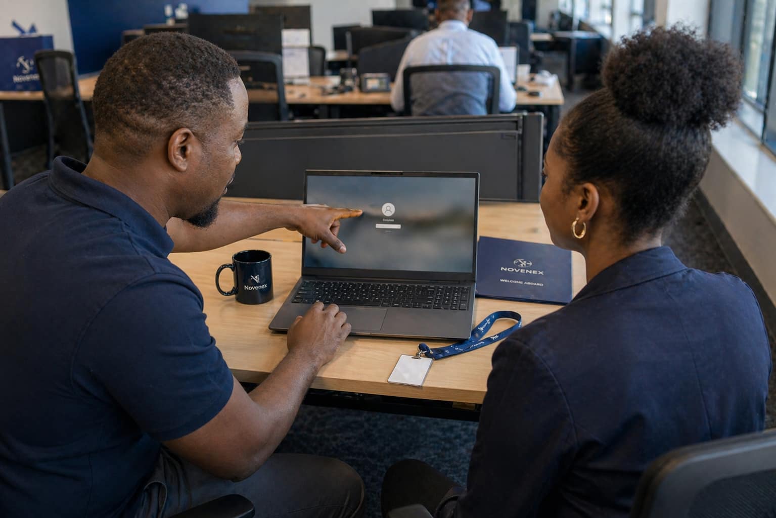 The Novenex team collaborating in the office